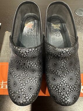 Dansko Black Metallic Floral-Patterned Clog